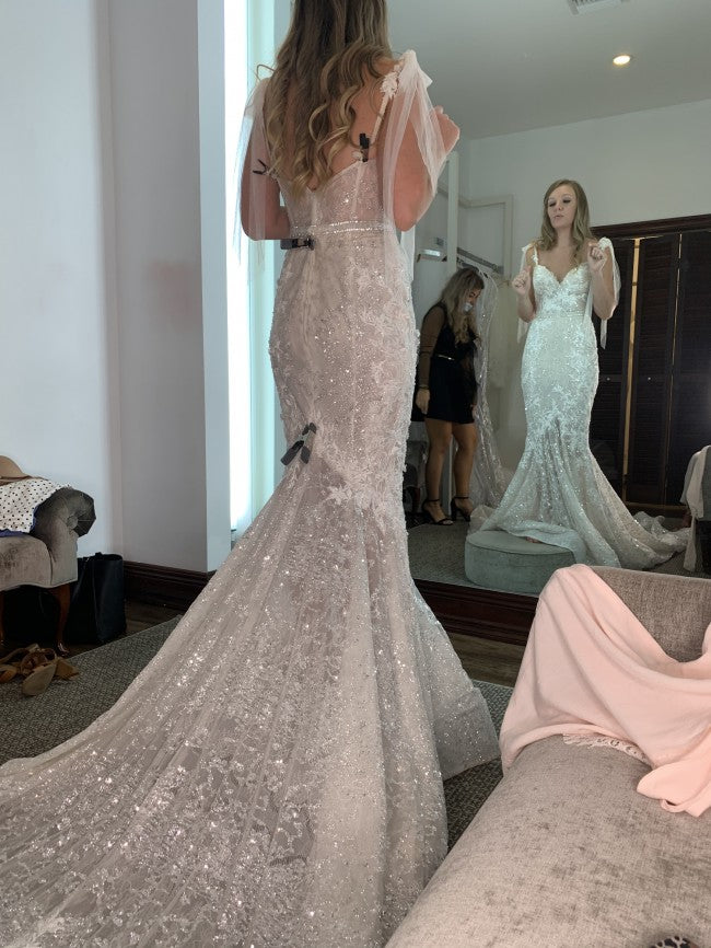 Lightly beaded sheer open sleeve wedding gown