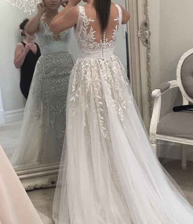 Sleeveless sheer back a-line style wedding gown