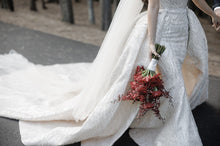 C2023-SD861 - sleeveless open neck line wedding gown with a beaded detachable train