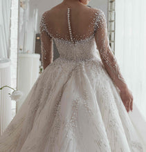 C2023-BG642 - Crystal beaded wedding ball gown w/ long sleeve illusion neckline