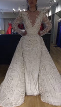 C2024-LS22B - beaded v-neck wedding gown with v-neckline and detachable overskirt train
