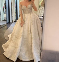 C2024-LSB60C - illusion neckline long sleeve wedding gown with swarovski crystal beading