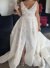 C2024-Leah46 - sleeveless v-neck wedding gown with slight empire waist line and 3D embellishments