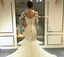 C2023-BLS419 - sheer long sleeve illusion neckline wedding dress with swarovski crystals