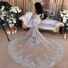 C2020 - BLS989 - swarovski crystal beaded long sleeve illusion neckline wedding gown with detachable over skirt train