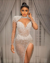 C2023-SLS11H - Sheer long sleeve swarovski crystal beaded evening gown with split