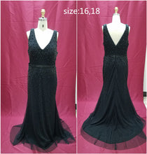 Sleeveless plus size evening dresses by Darius