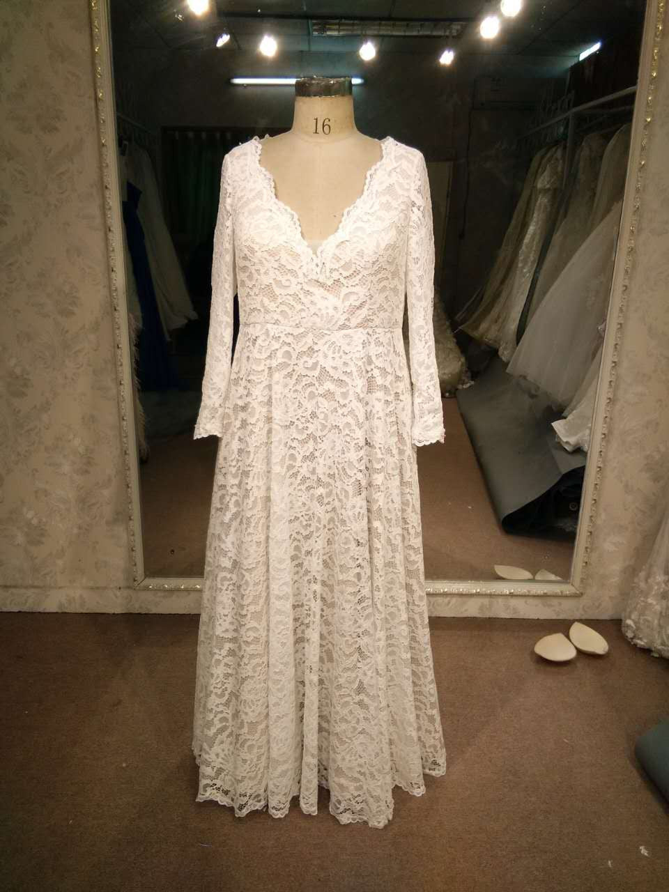 Robe de mariée en dentelle grande taille à manches longues 