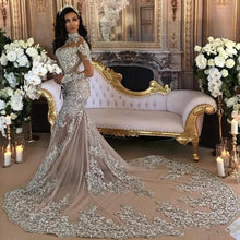 C2020 - BLS989 - swarovski crystal beaded long sleeve illusion neckline wedding gown with detachable over skirt train